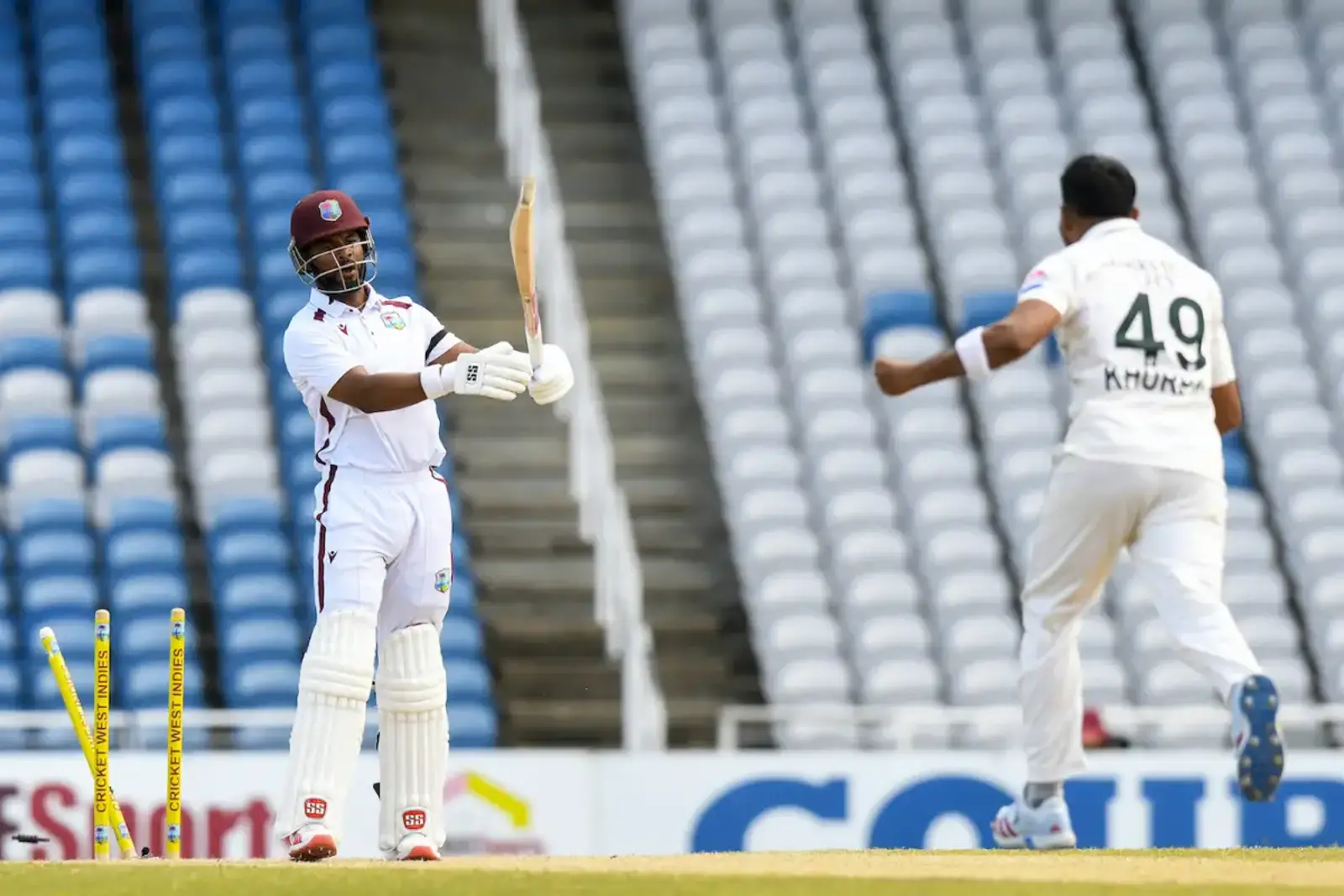 Khurram Shahzad celebrates dismissing Shai Hope (AFP/Getty Images)