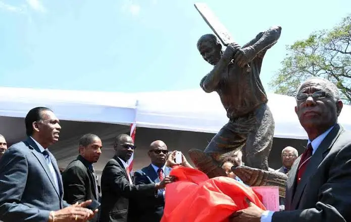 A statue of Collie Smith was unveiled at Boys’ Town in 2018 on a stretch of road named after him