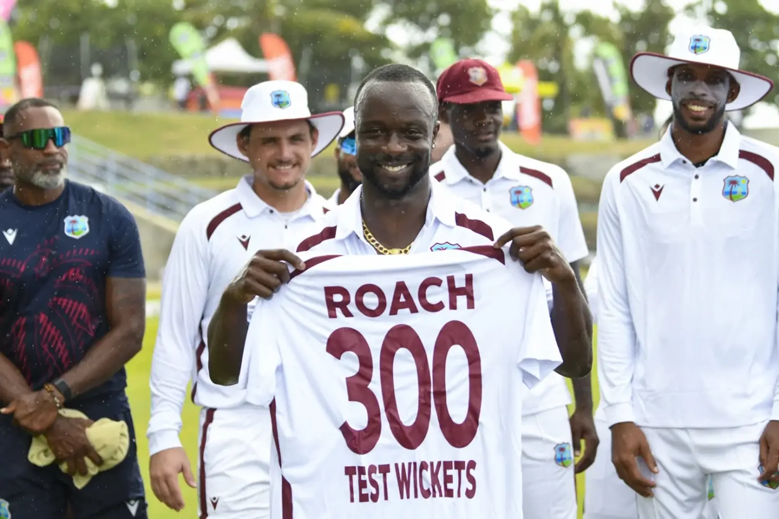 Kemar Roach presented with '300 Test Wickets' t-shirt to mark milestone (AFP/Getty Images)