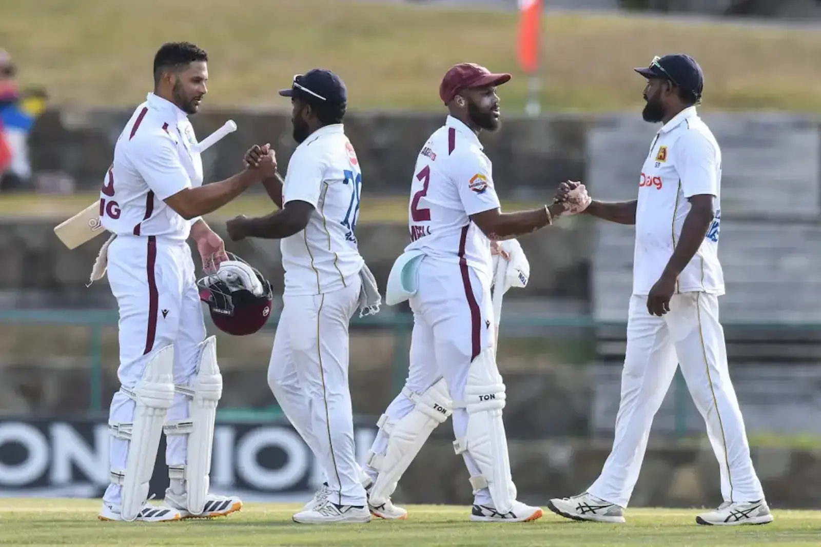 Handshakes signal the end of the Test (AFP/Getty Images)